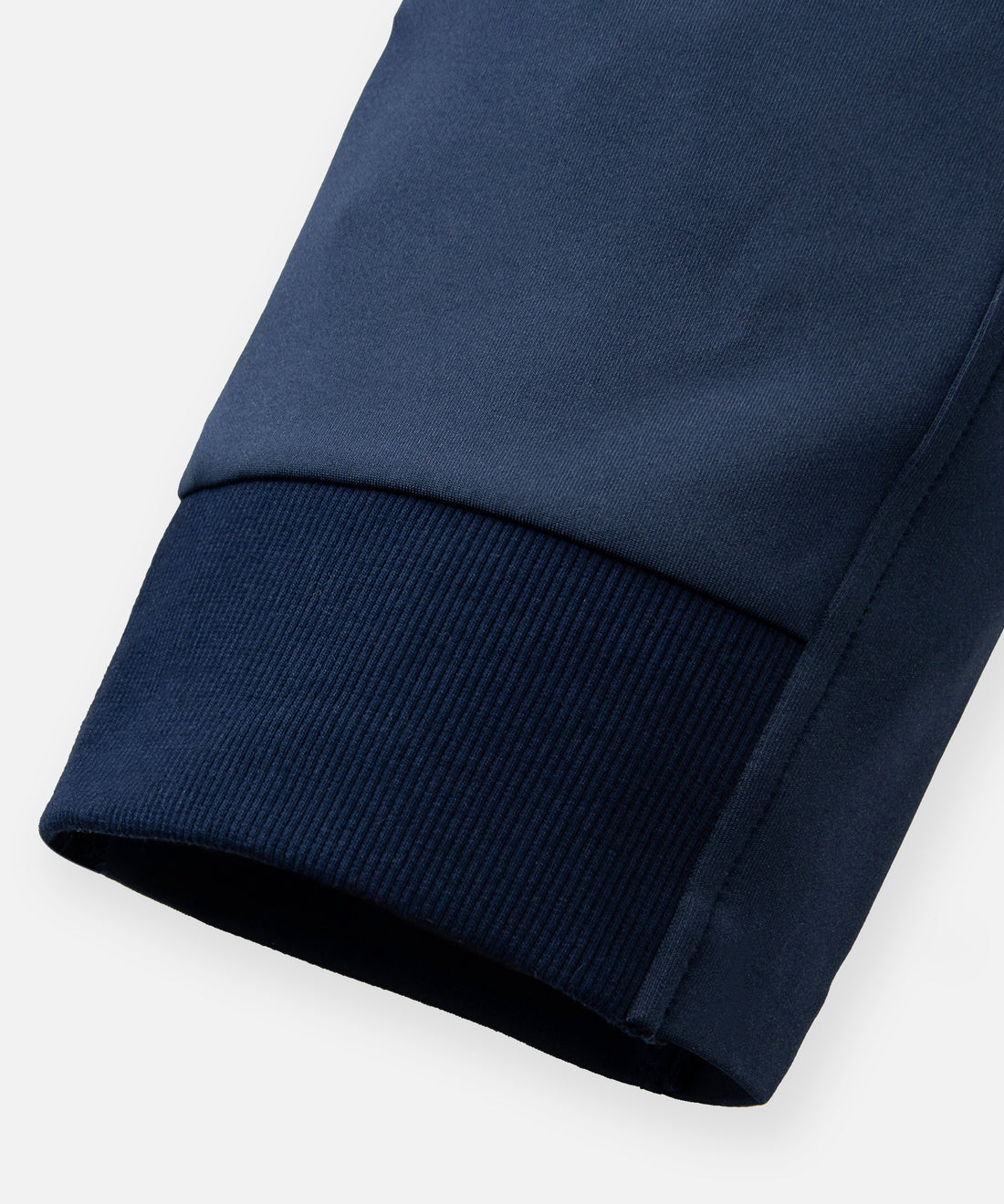 CUSTOM_ALT_TEXT: Ribbed  back hem on Paper Planes Slim Fit Chromatic Jogger color Naval Academy.