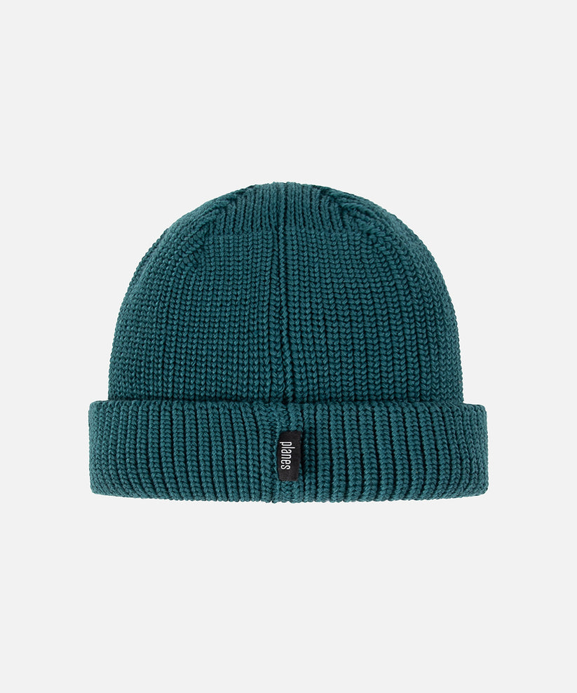 CUSTOM_ALT_TEXT: Planes label on back brim of Paper Planes Wharfman Beanie, color Atlantic Deep.