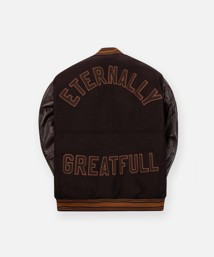 CUSTOM_ALT_TEXT: ETERNALLY GREATFULL chenille embroidery on back of Paper Planes Eternally Greatfull Varity Jacket, color Brown.