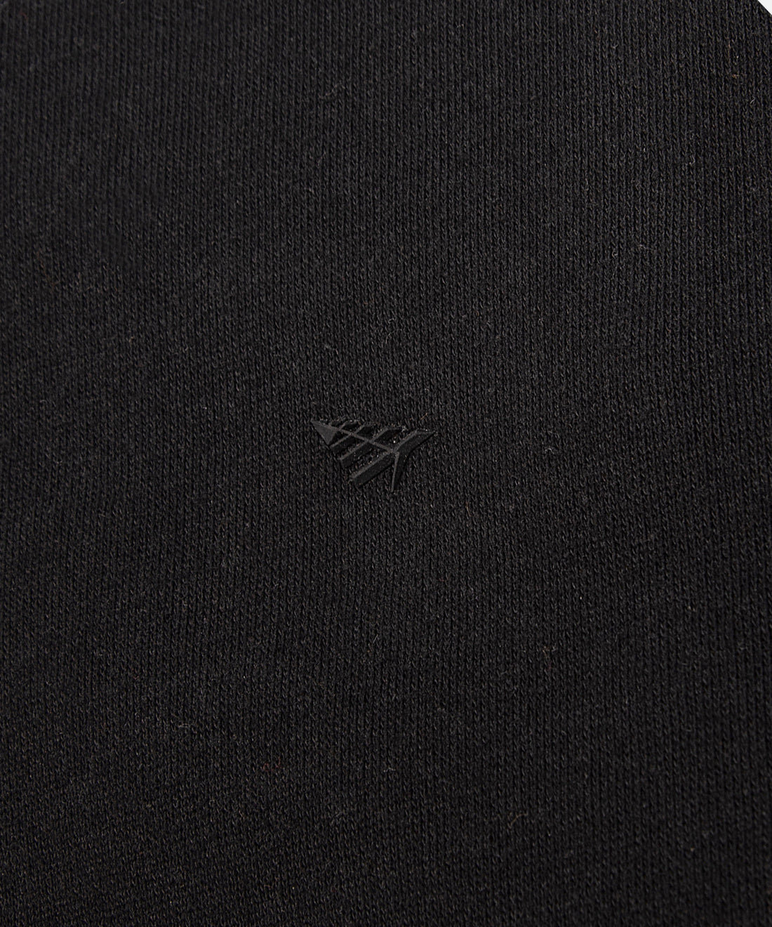 CUSTOM_ALT_TEXT: High-density silicone transfer Plane icon on Paper Planes Dream Lab Sweatshirt, color Black.