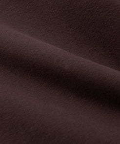 CUSTOM_ALT_TEXT:Fabric closeup of Paper Planes Women’s Brushed Surface Fleece Sweatpant color Coffee.