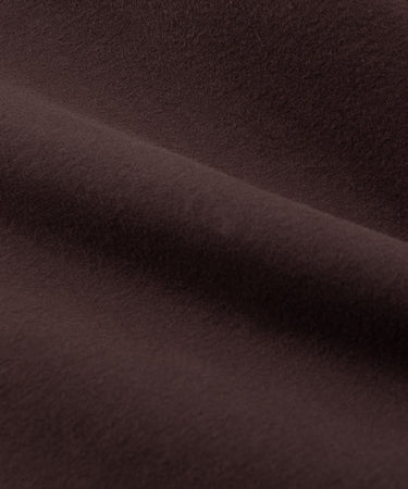 CUSTOM_ALT_TEXT:Fabric closeup of Paper Planes Women’s Brushed Surface Fleece Sweatpant color Coffee.