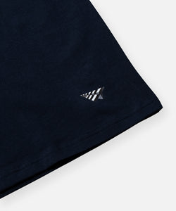 CUSTOM_ALT_TEXT: Heat transfer plane logo above left hem on Paper Planes Essential 3-Pack Tee, color Midnight.