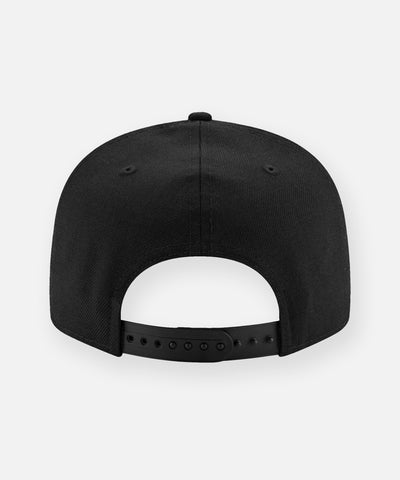 CUSTOM_ALT_TEXT: Back of Paper Planes The Original Crown 9Fifty Snapback Hat with Black Undervisor.