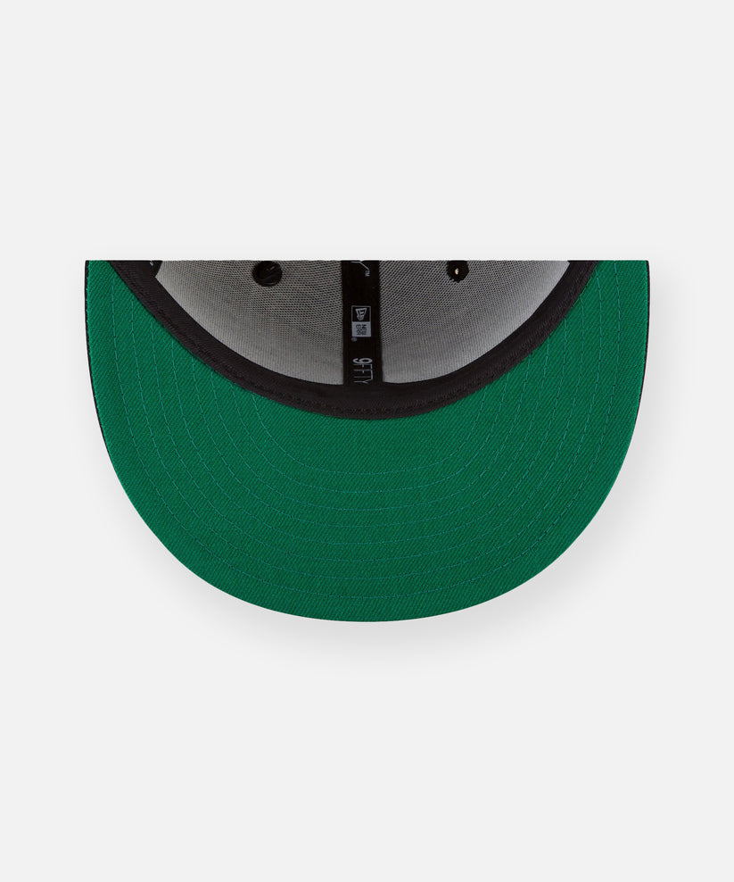 CUSTOM_ALT_TEXT: Green undervisor on Paper Planes The Original Crown 9Fifty Snapback Hat.